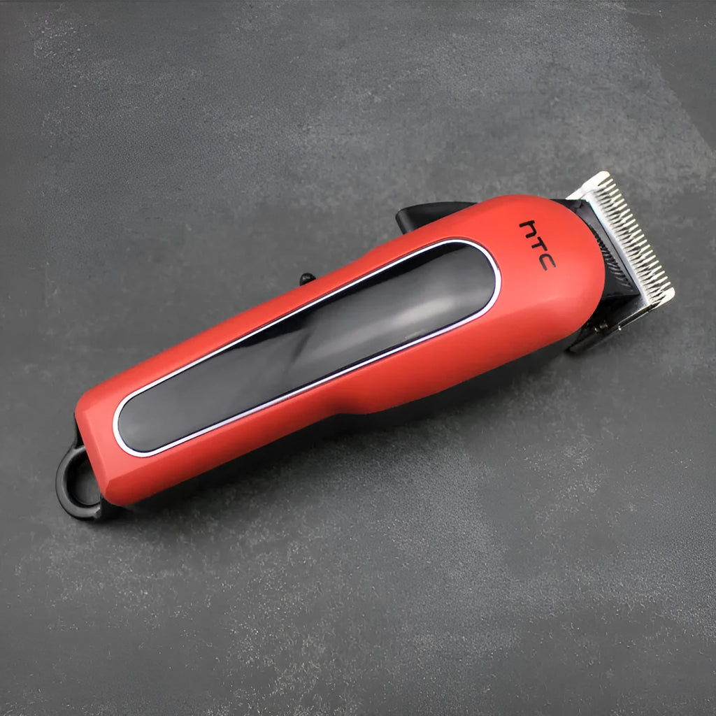 Professional digital electric hair clipper with charger, combs, and accessories in black, red, or white colour.