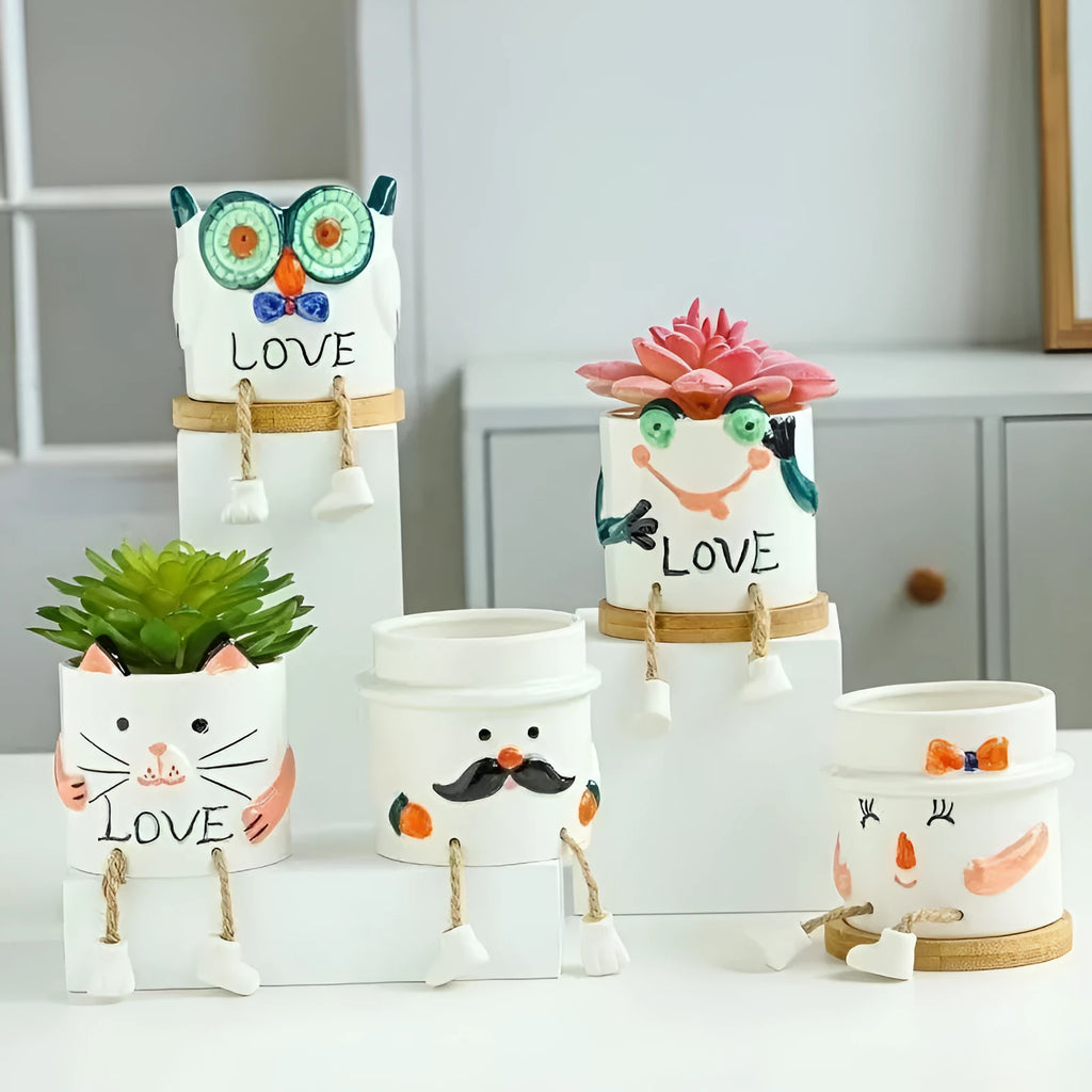 Ceramic hanging foot flowerpot in cartoon style for succulent plants on desktop