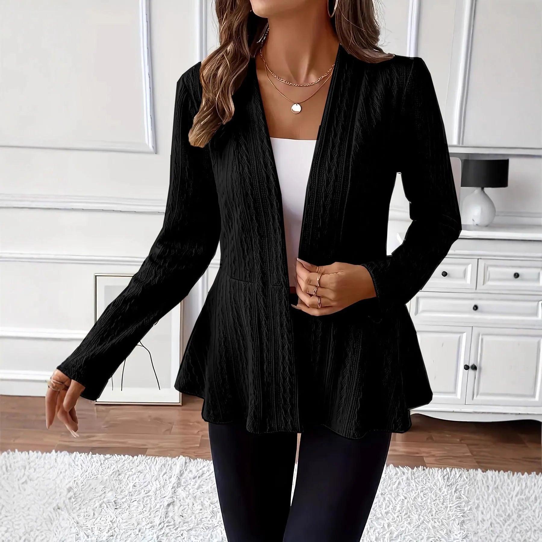 Women's apricot tight fit knitted cardigan with jacquard pattern and a single button.