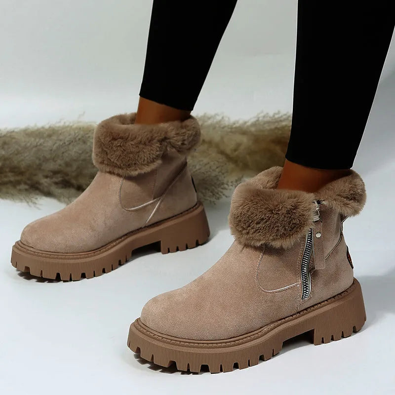Women's black high-top snow boots with side zipper and faux fur lining shown alongside khaki colour option
