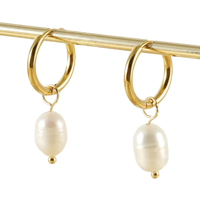 Gold geometric pearl earrings in stainless steel with titanium steel components
