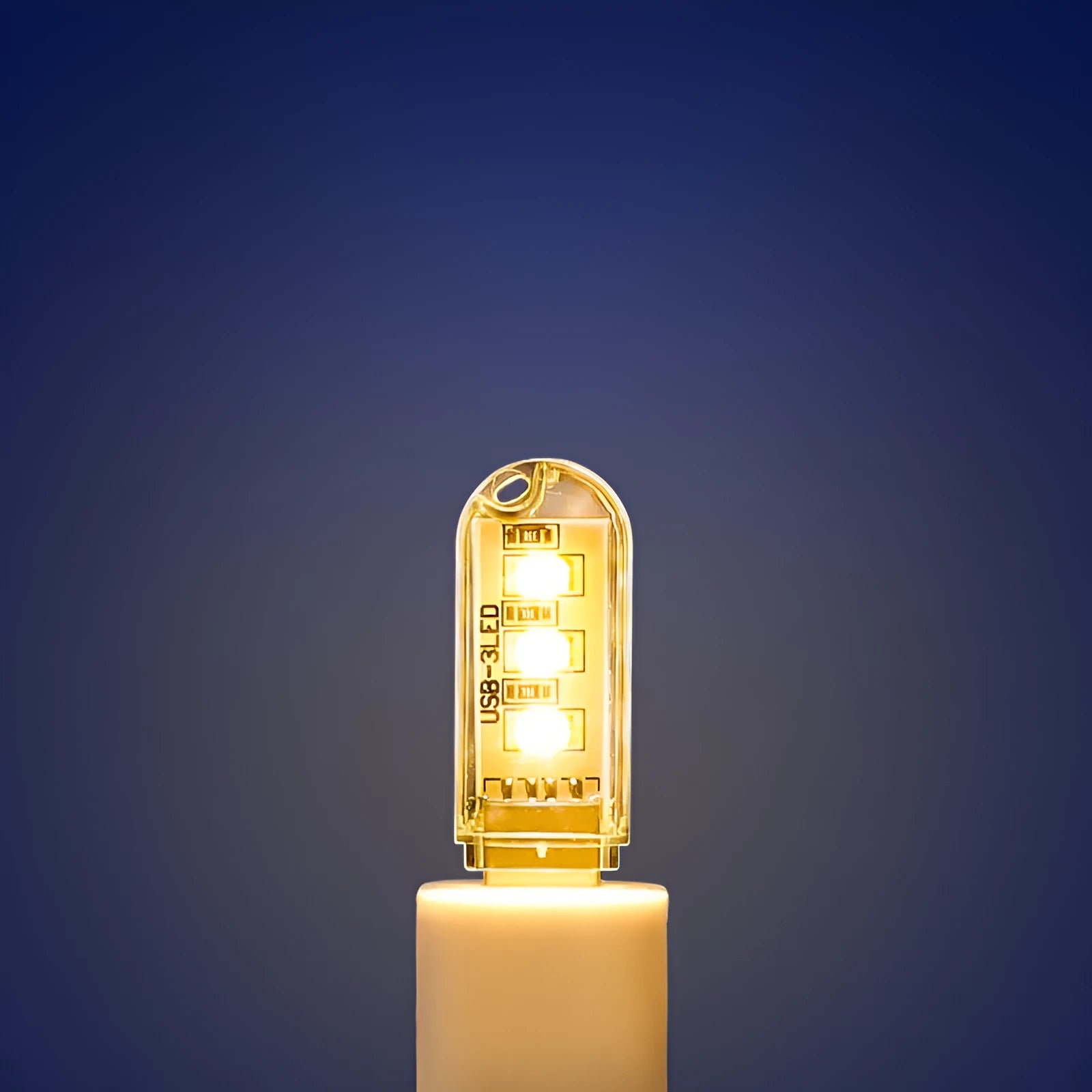Compact USB-powered LED baby night light with white and warm light options measuring 6cm by 1.8cm