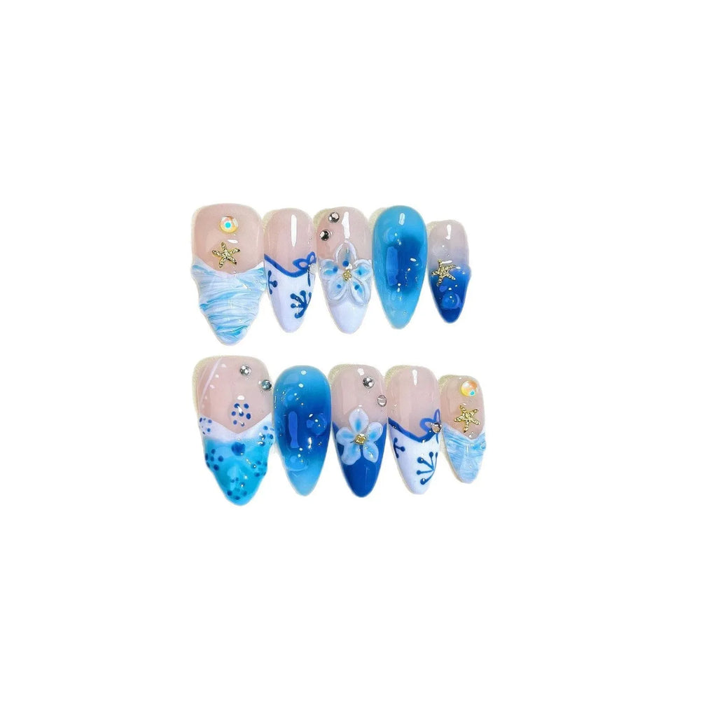 Blue hand-painted carved summer ice transparent plastic fake nails with dimensional design
