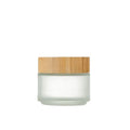 Bamboo wood cover frosted glass cream bottle with inner cushion, shown in transparent and frosted, 50g 60g 100g.