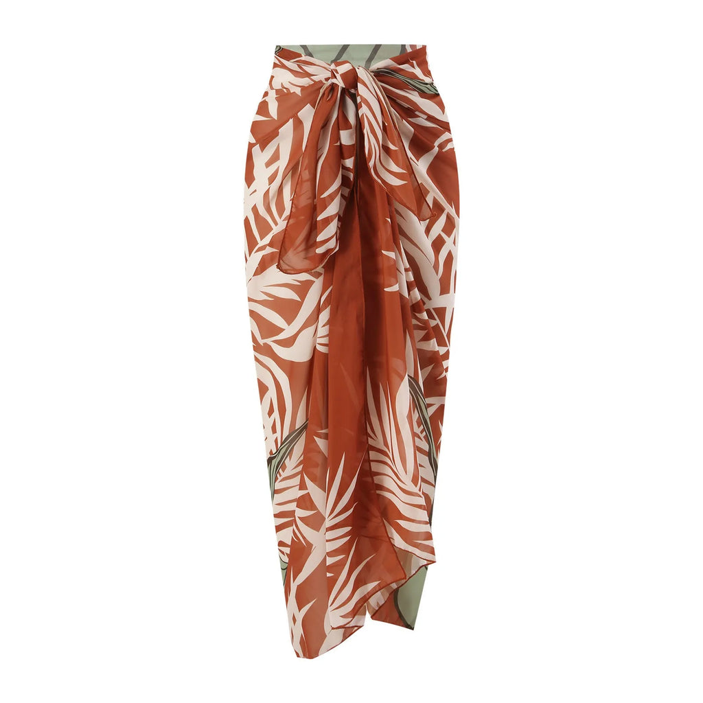 Women's brown push up bikini with high waist briefs and a matching sheer chiffon dress overlay.