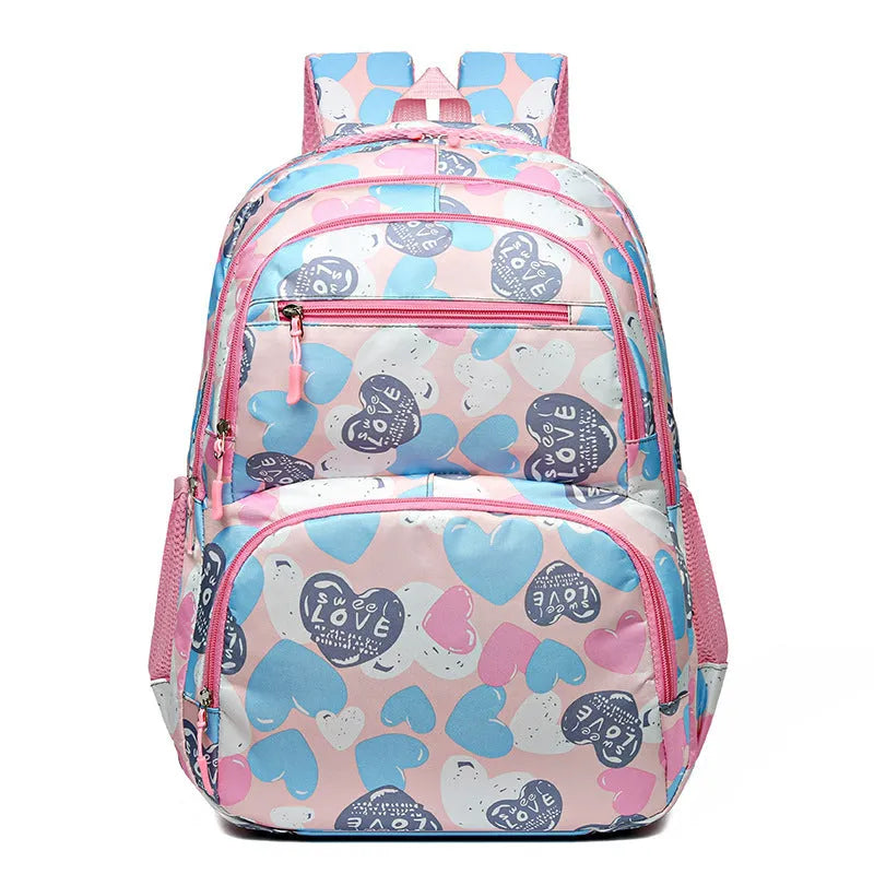 Blue student school backpack with air pillow belt straps and large main compartment.