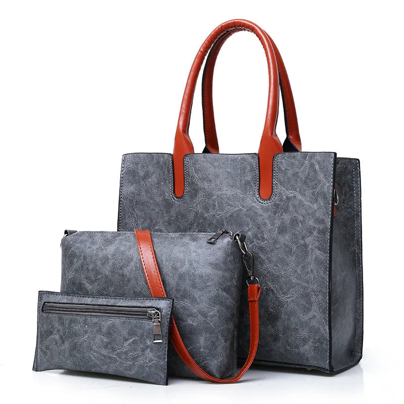 Three-piece women's retro fashion bag set in solid colour PU material with shoulder strap