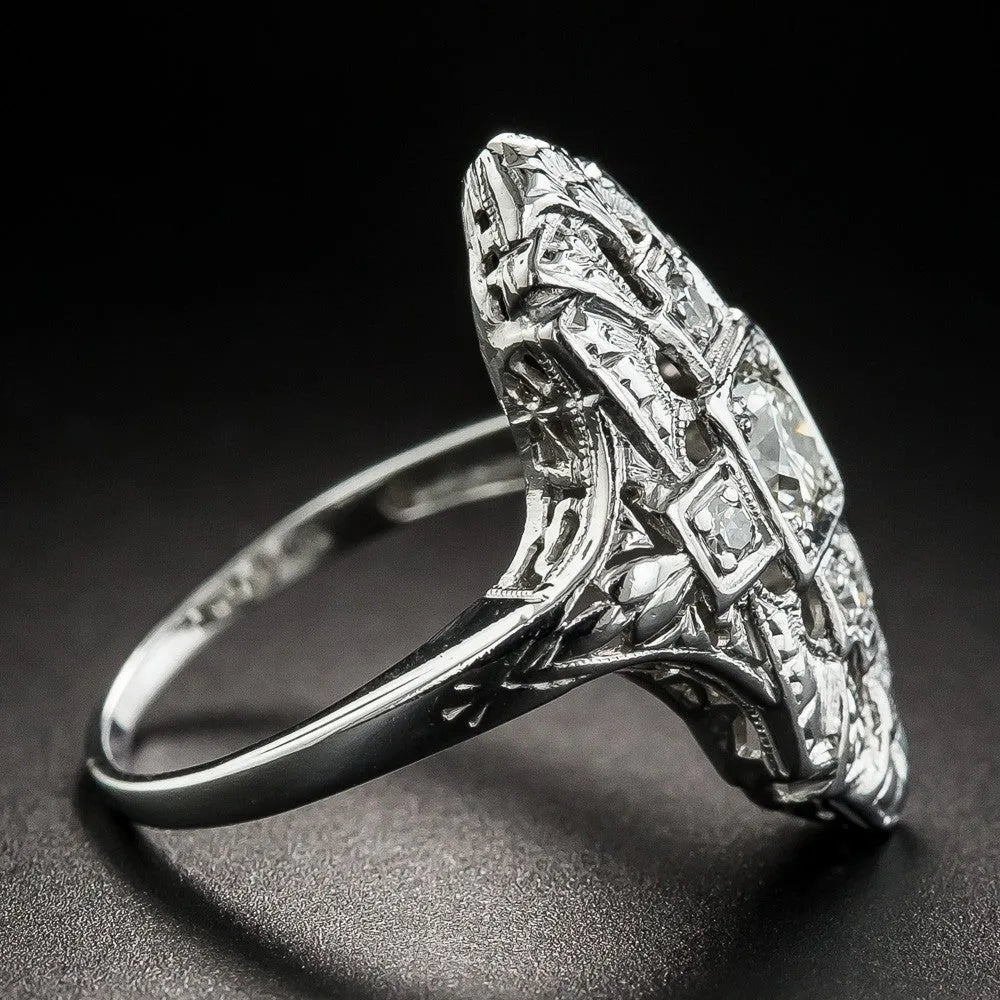 Geometric hollow out silver ring with diamond stud accents on copper base