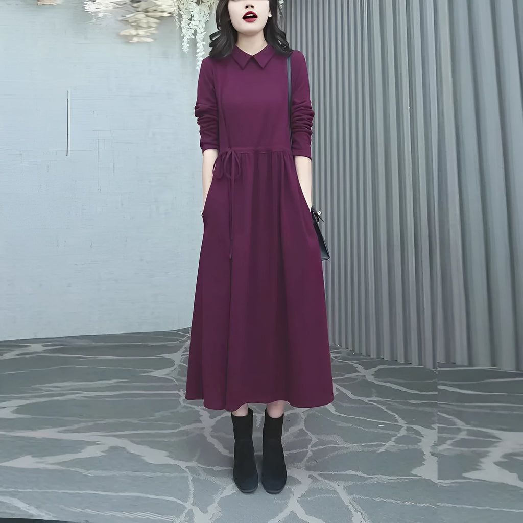 Purplish red women's long sleeve midi dress for winter, shown in a plus size.