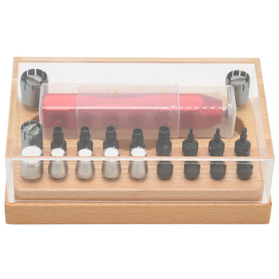 Set of 20 steel watch repair extracting tubes for opening watch cases on a repair mat.