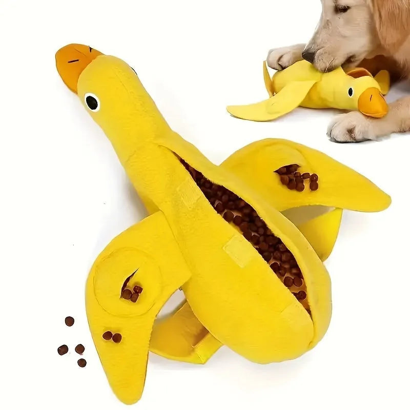 Yellow teddy duck dog toy with food leak openings and squeaker for training and chewing