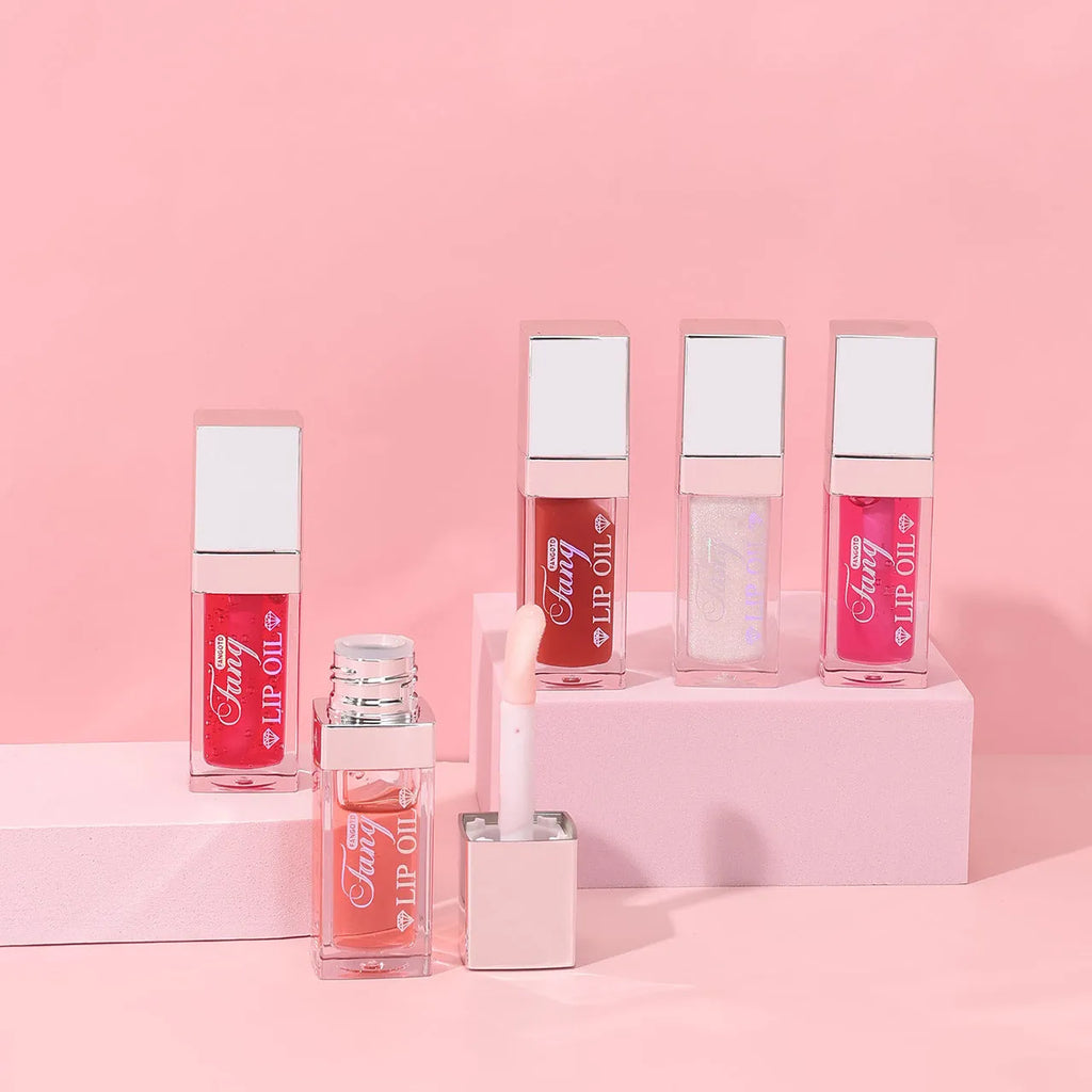 Five lip gloss and lipstick applicators in shades Style001, Style006, Style007, Style012, and Style015.