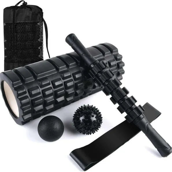 Black foam massage roller measuring 33cm with six separate massage pieces along shaft