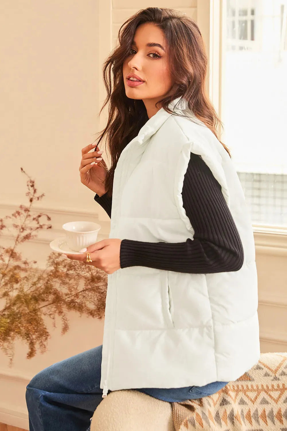 Beige oversized puffer vest with zip front and stand neck, 100% polyester, sizes S to 2XL