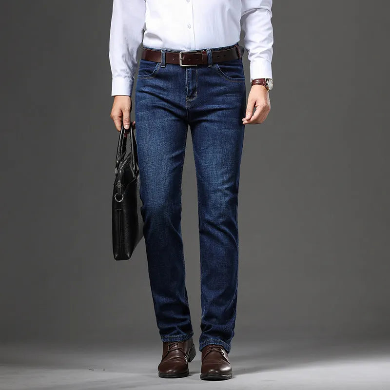 Stretch denim jeans in loose plus size with straight leg and mid waist design
