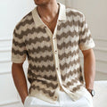 Man modelling a yellow short sleeve sweater with a textured corrugated jacquard pattern, suitable for summer.
