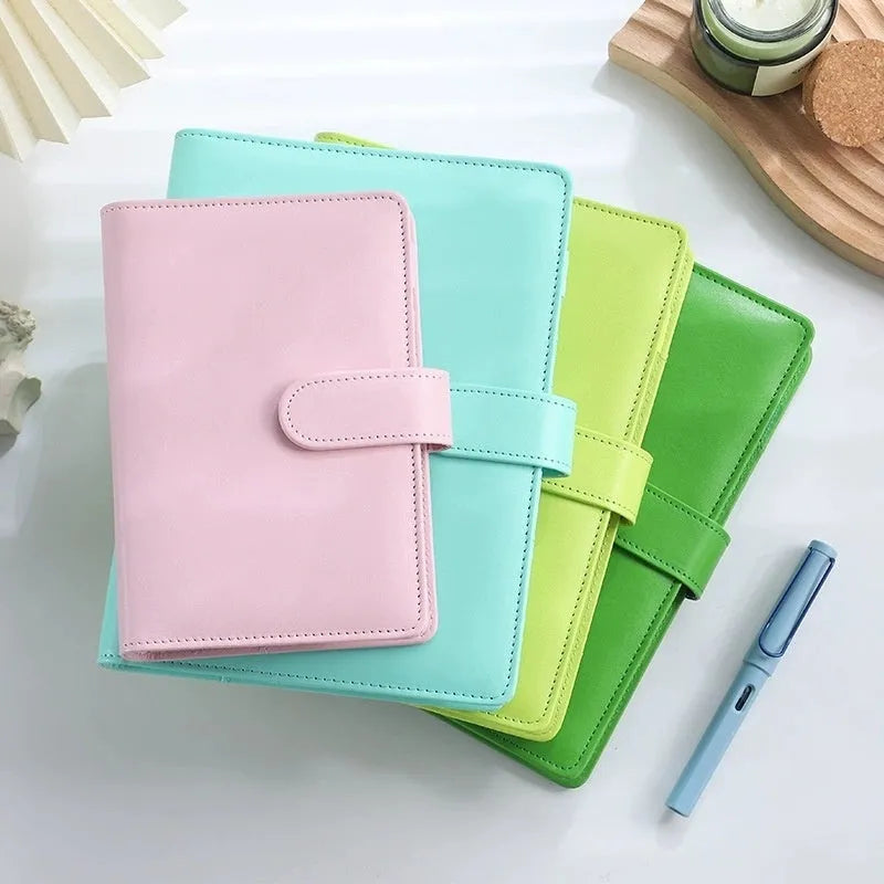 A5 PU leather notebook binder shell with zipper closed, shown in a selection of solid colours.