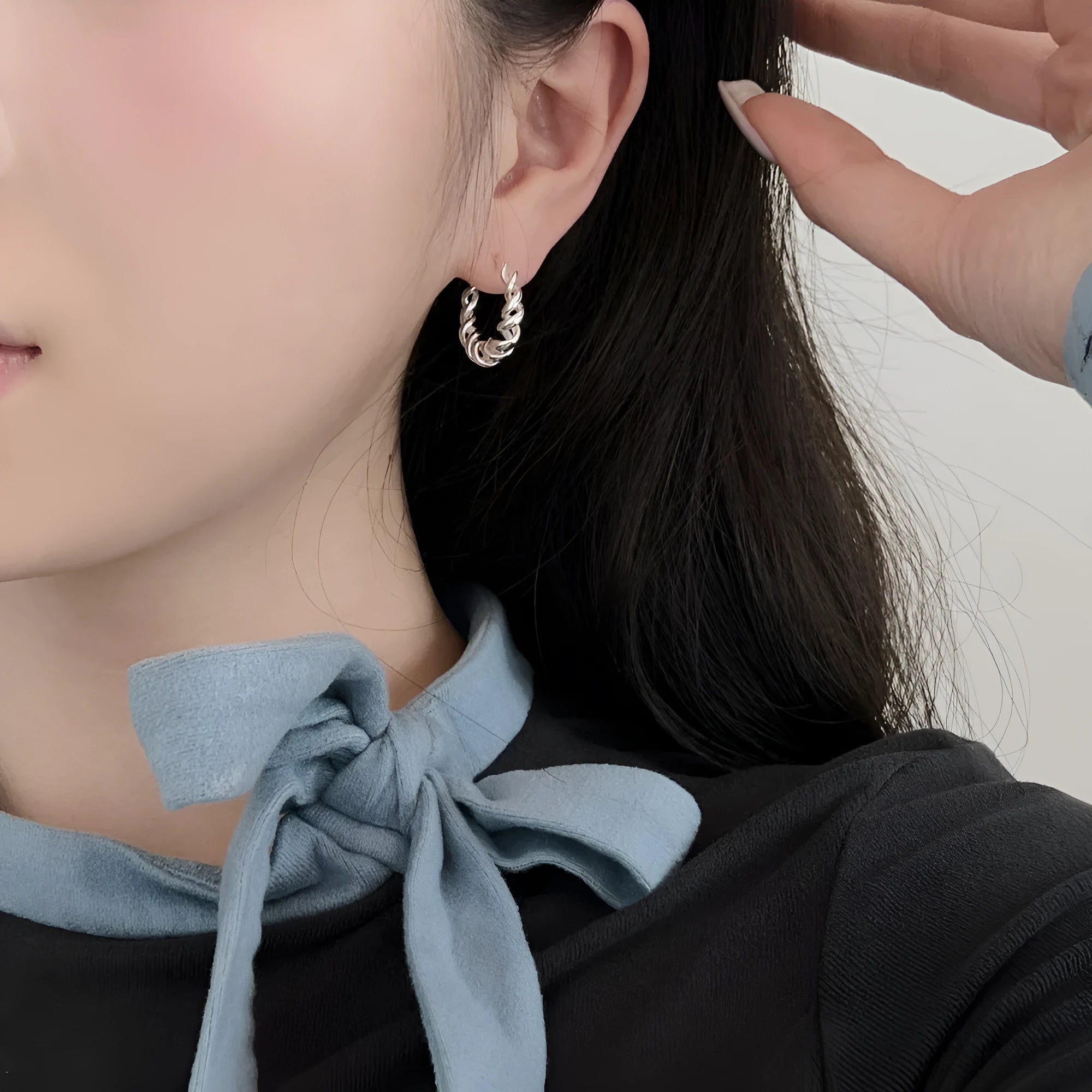 Argent Pur 925 silver ear studs with electroplated silver finish on a neutral background
