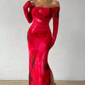 Long green gradient fishtail mesh dress with a square collar and pleated detailing on a mannequin.
