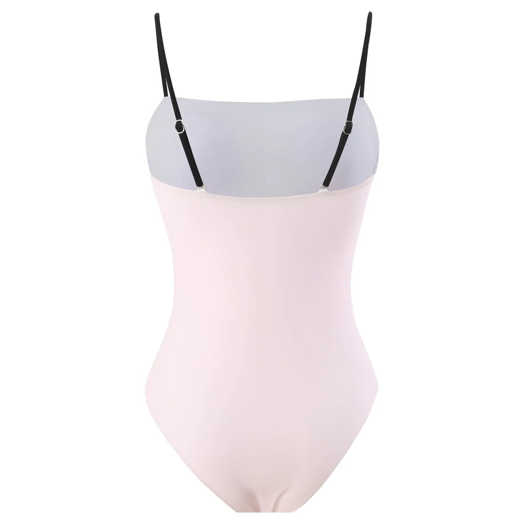 Women's one-piece bikini swimsuit with an attached white tulle skirt, shown on a mannequin.