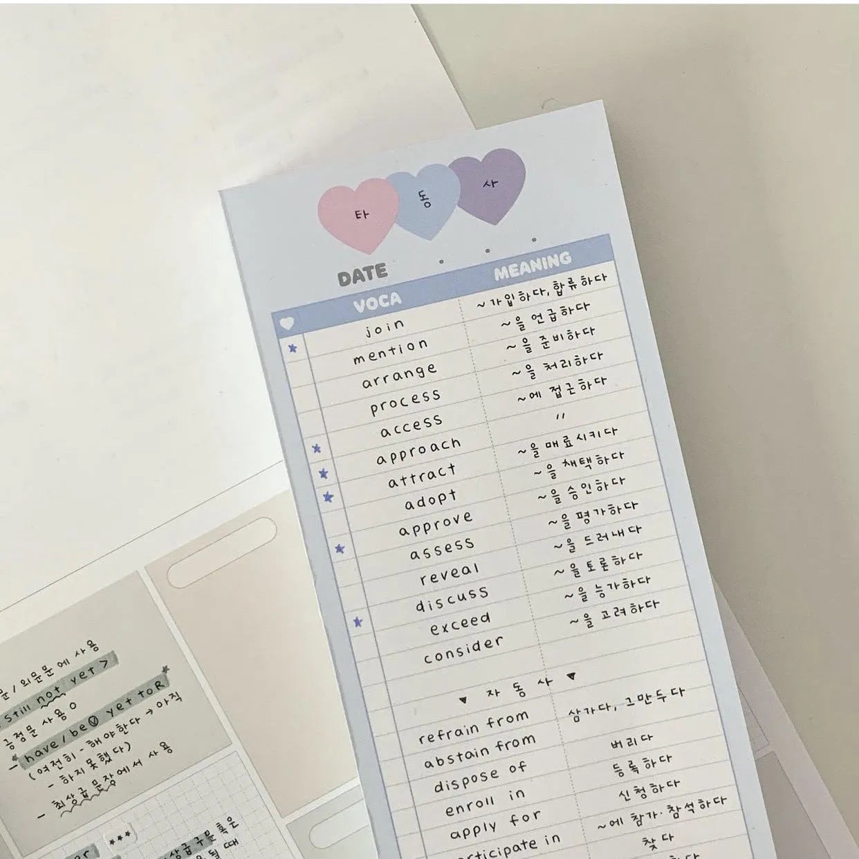 Vertical half-B5 notepad with double-sided printing in pink, purple, or blue cover colours
