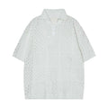 Short-sleeved hollow knit polo shirt in black or white, loose fit cardigan style for teenagers