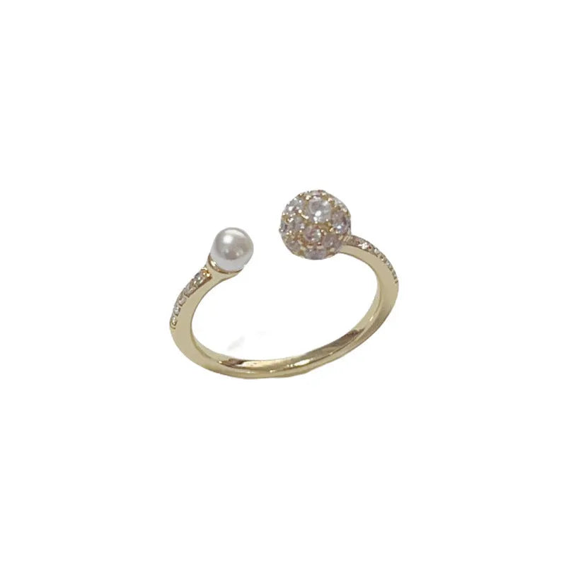 Round zircon open-end pearl ring with geometric design in gold or silver colour options