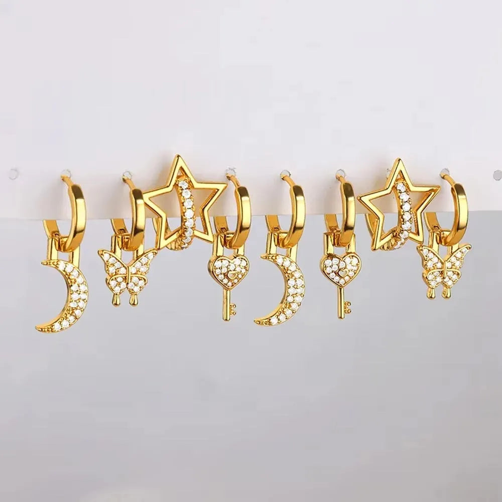Women's copper butterfly earrings with geometric heart, star, and bow shapes in assorted colours.