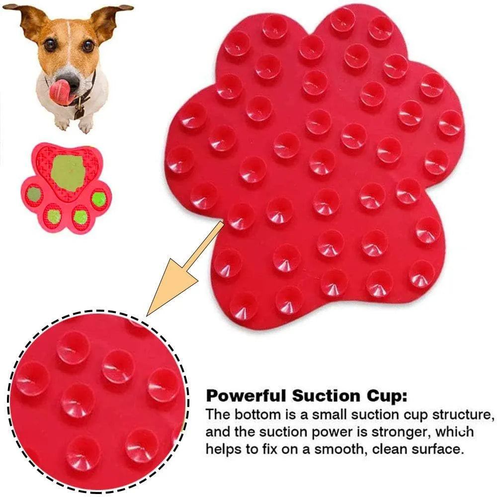 Blue silicone dog licking mat with bone texture and suction cups on a white tile background.