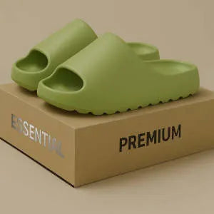 Women's thick sole beach slippers in black, green, and brown colours on a plain background