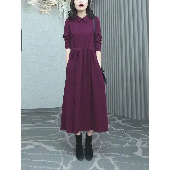 Purplish red women's long sleeve midi dress for winter, shown in a plus size.
