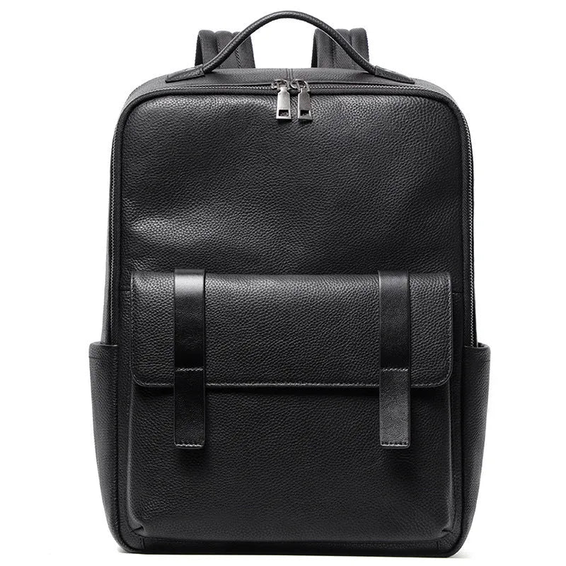 Men's black genuine leather computer backpack with curved back plate showing litchi grain texture and substantial 36-55L capacity.