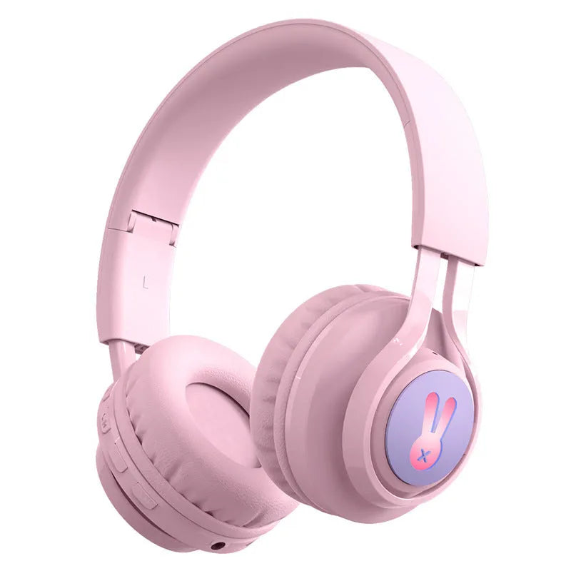 Wireless children's headphones with RGB LED lights in bunny pink colour showing power display