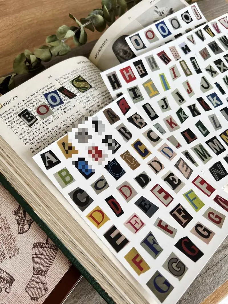 Set of cute-style printed English letter and weekly word decoration stickers for labelling and organisation.