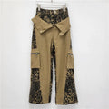 Dark khaki leopard print high waist jeans with fake stitching detail and straight leg cut