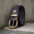 Men's casual leather belt in cattlehide with copper buckle shown in black, brown, and khaki colours