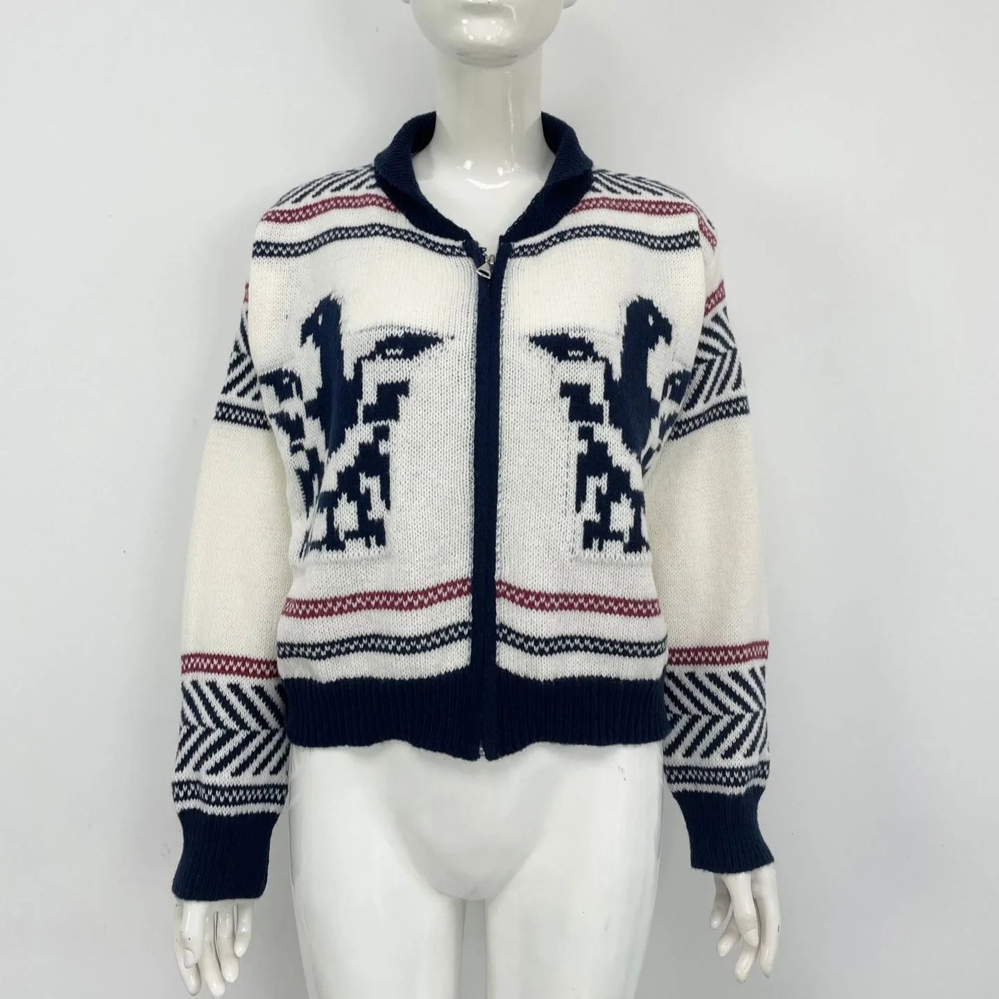 White women's zip-front cardigan sweater with a contrasting jacquard lapel and stripe pattern.