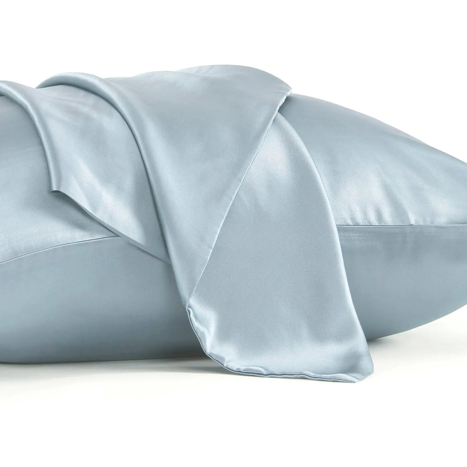 Dark grey 19 momme mulberry silk pillowcase showing envelope closure on a bed.