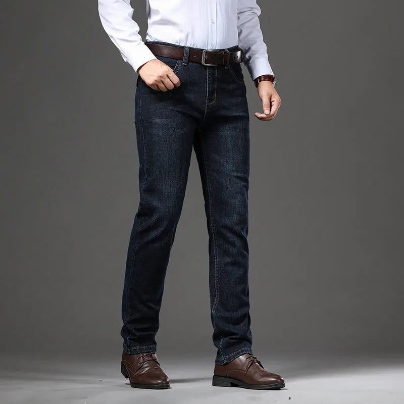 Stretch denim jeans in loose plus size with straight leg and mid waist design