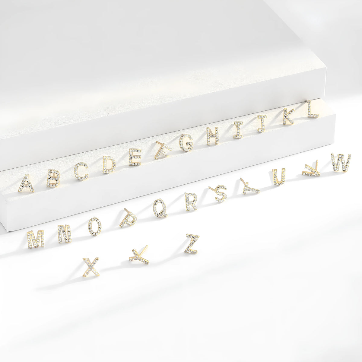 Pair of 925 silver English letter ear studs with electroplated gold or platinum colour finish for women