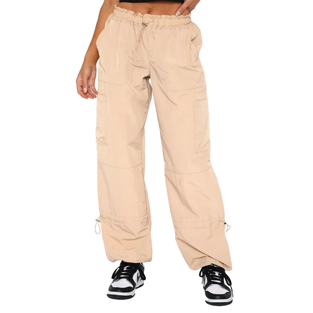 Straight leg multi-pocket cargo casual pants in polyester, shown in a neutral colour with a loose fit.