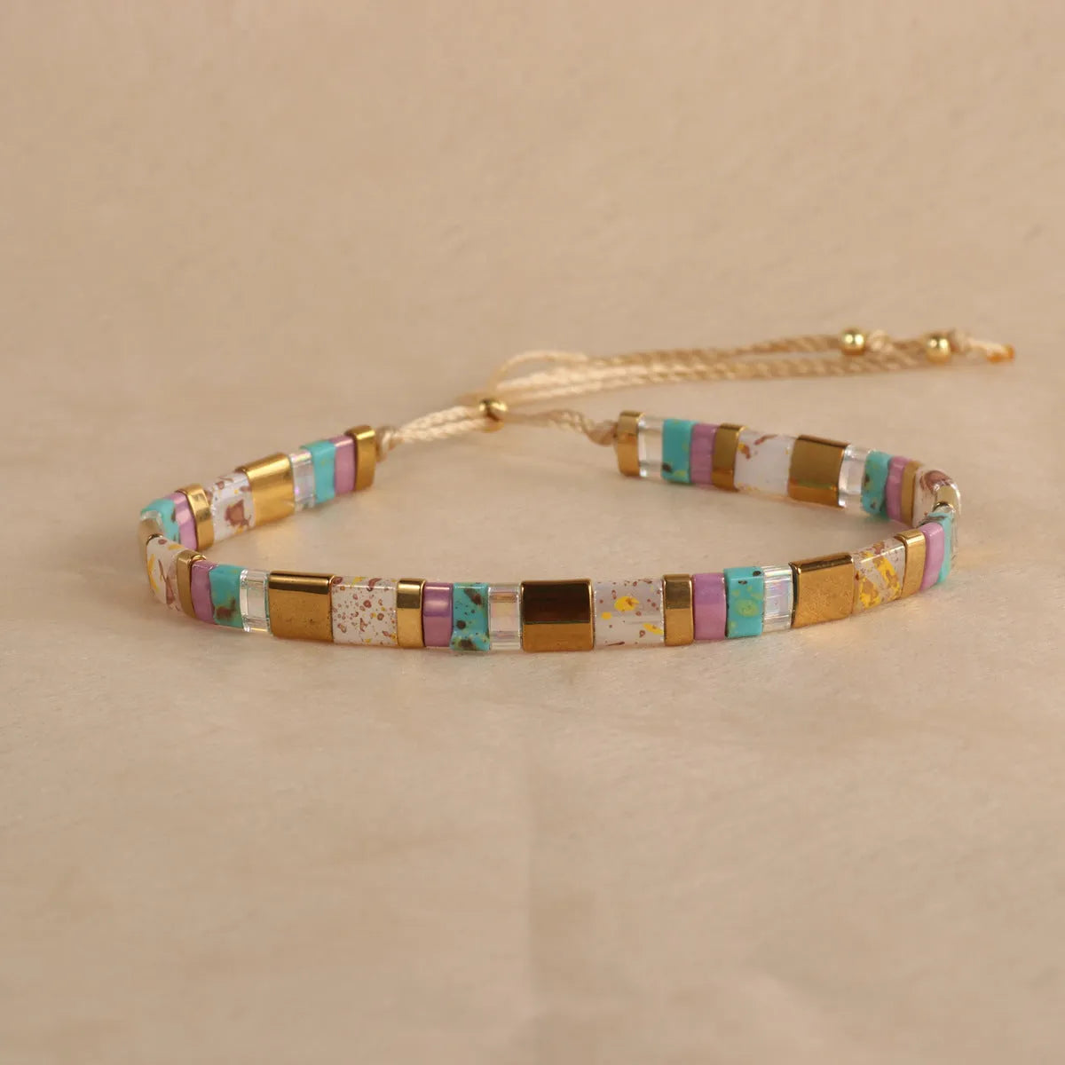 European American style pull bead bracelet with geometric designs in five colour options