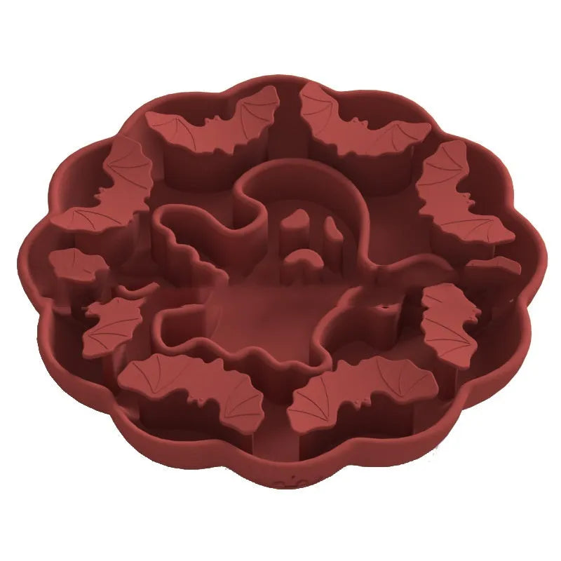 Edible silicon anti-choke slow feeding dog bowl in Halloween orange colour on floor