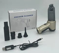 Handheld car vacuum cleaner with wireless charging dock in gold finish, showing compact 165x140x90mm dimensions