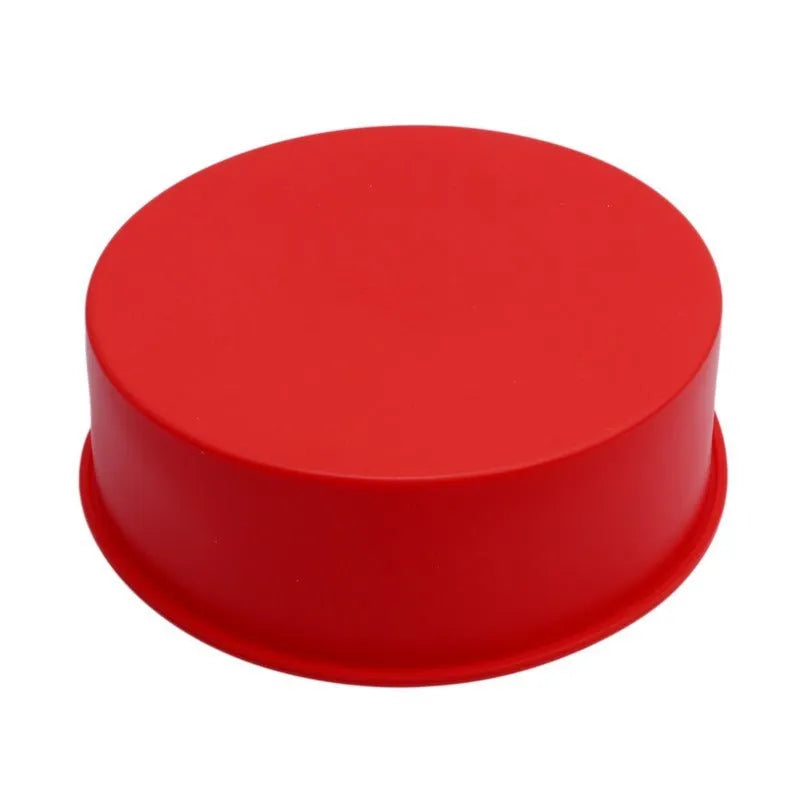 Set of three round red silicone cake moulds in 4-inch, 6-inch, and 8-inch sizes.