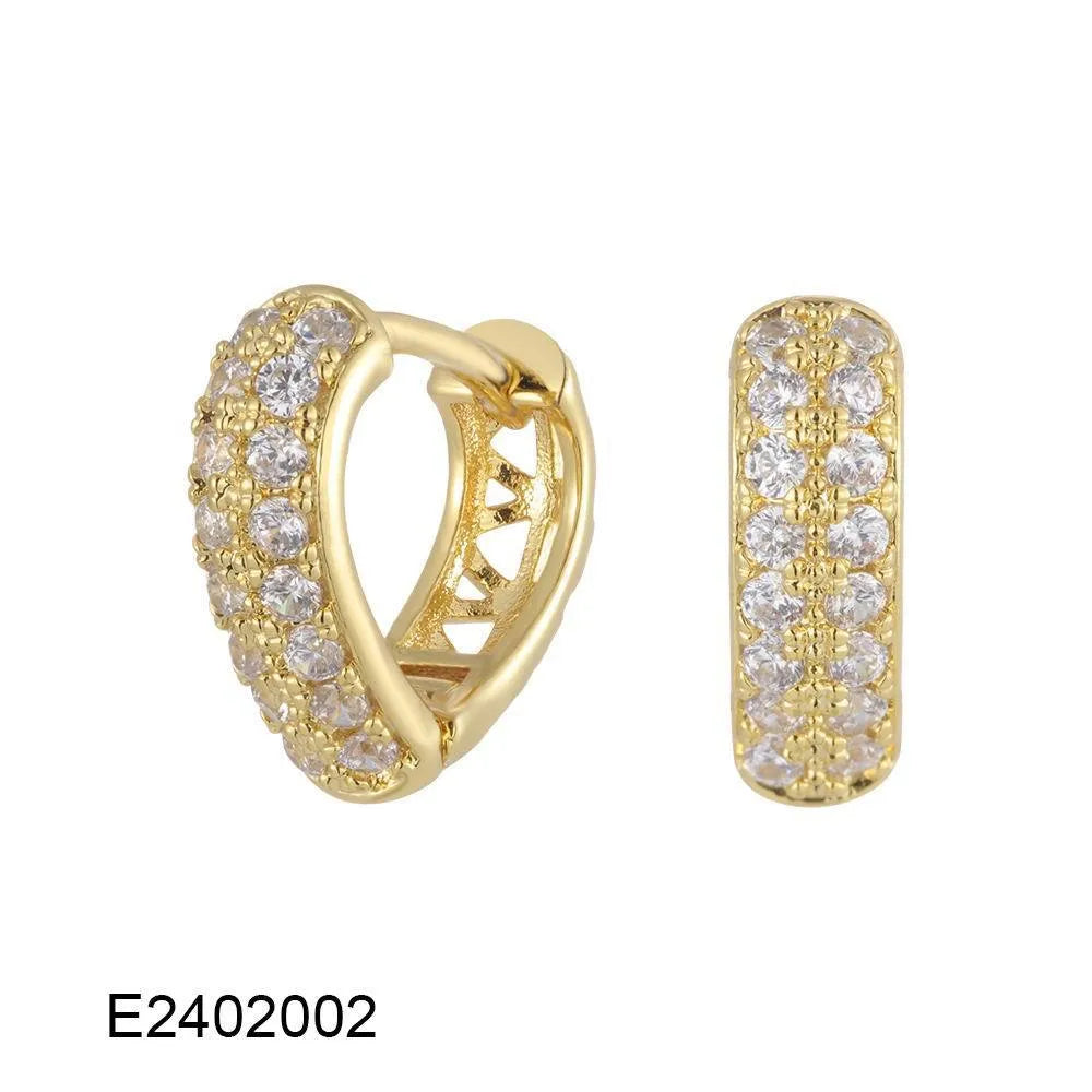 Gold plated heart shaped ear clip earrings with cubic zirconia stones, clip-on back visible