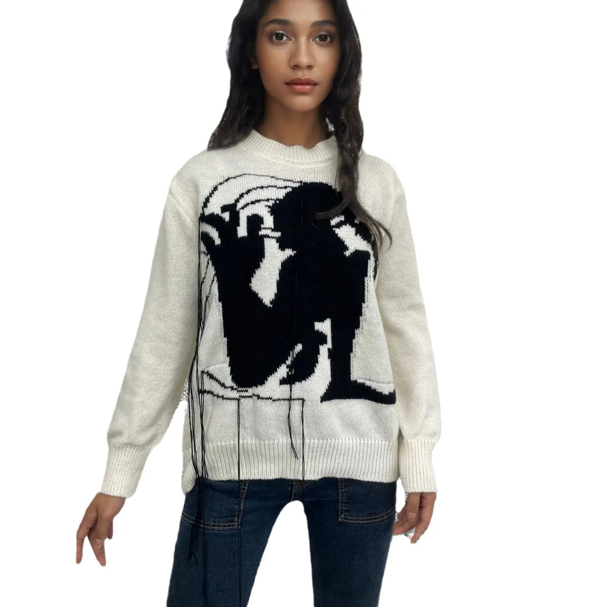 Women's loose fit alpaca wool sweater with tassel details and abstract pattern in street fashion style