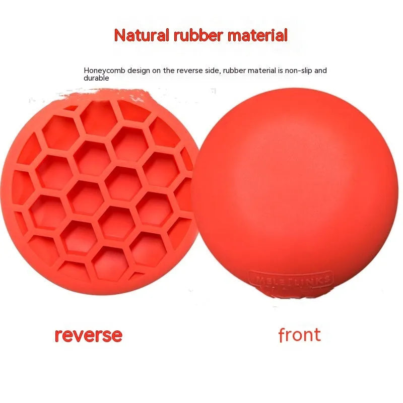 Orange golf training mat with centre of gravity design on natural rubber surface