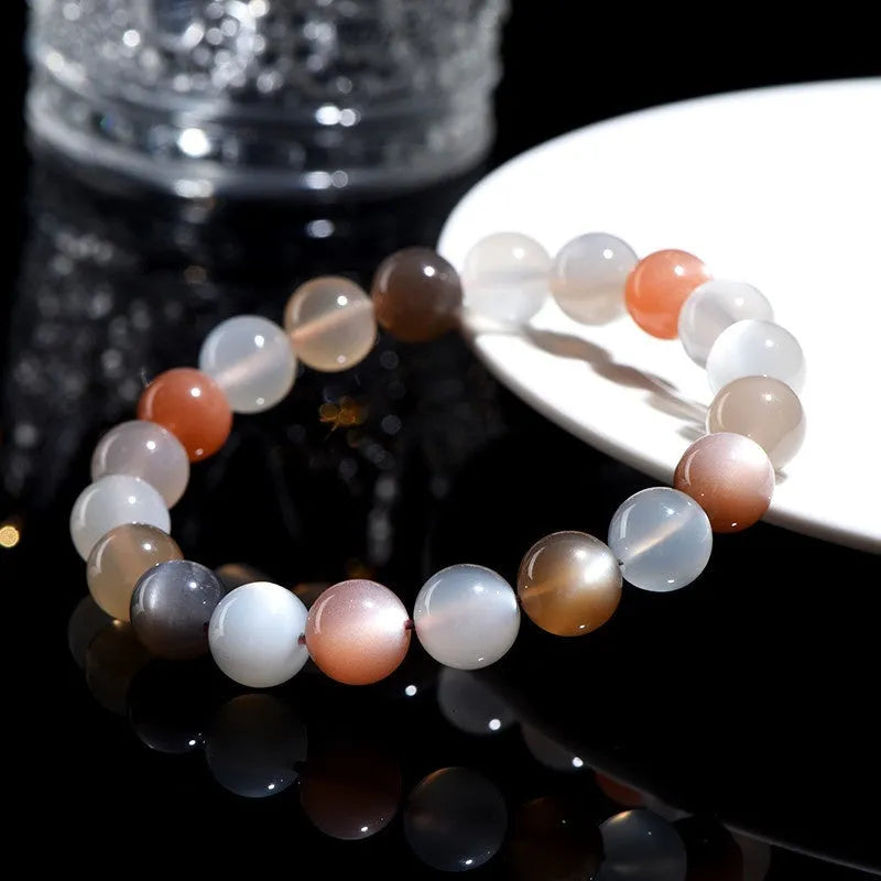 Natural moonstone bracelet with colourful moon light appearance showing 8mm beads in single circle formation