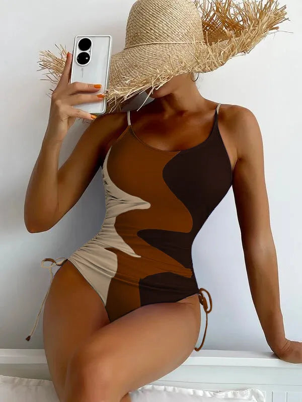 Women's blue one-piece swimsuit with sleeveless design and fixed swimming trunks